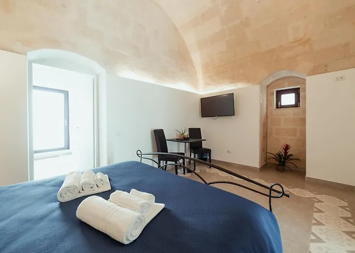 Le Dimore Nel Cortile Con Patio E Parcheggio Privato Pensión